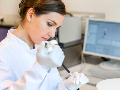 Scientist with syringe